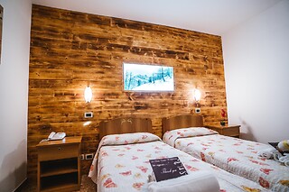 Soggiorno di una notte tra gusto e benessere presso Baita Cerato Wellness Hotel in provincia di Verona